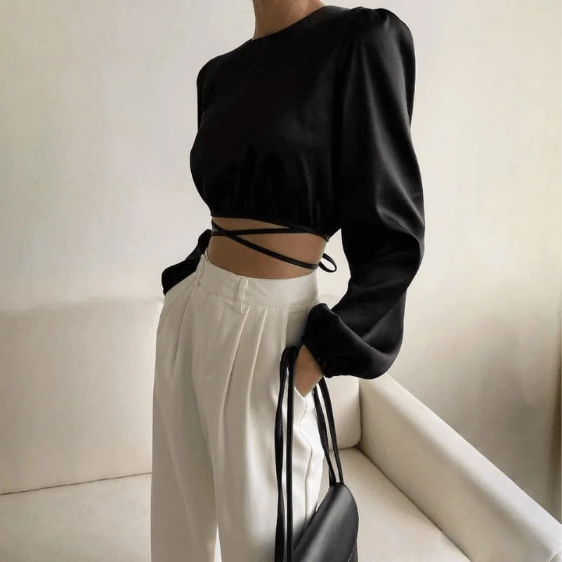 Hurry In form-fitting dressSatin Black Long Sleeve Top